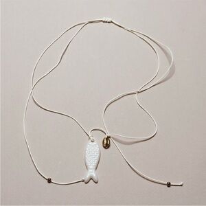 Anthropologie White Fish Pendant Necklace with Gold Charm